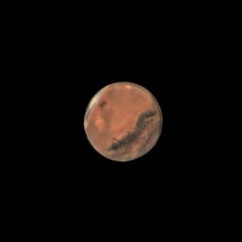 Mars showing dark surface markings, stacked and sharpened in Akastroid