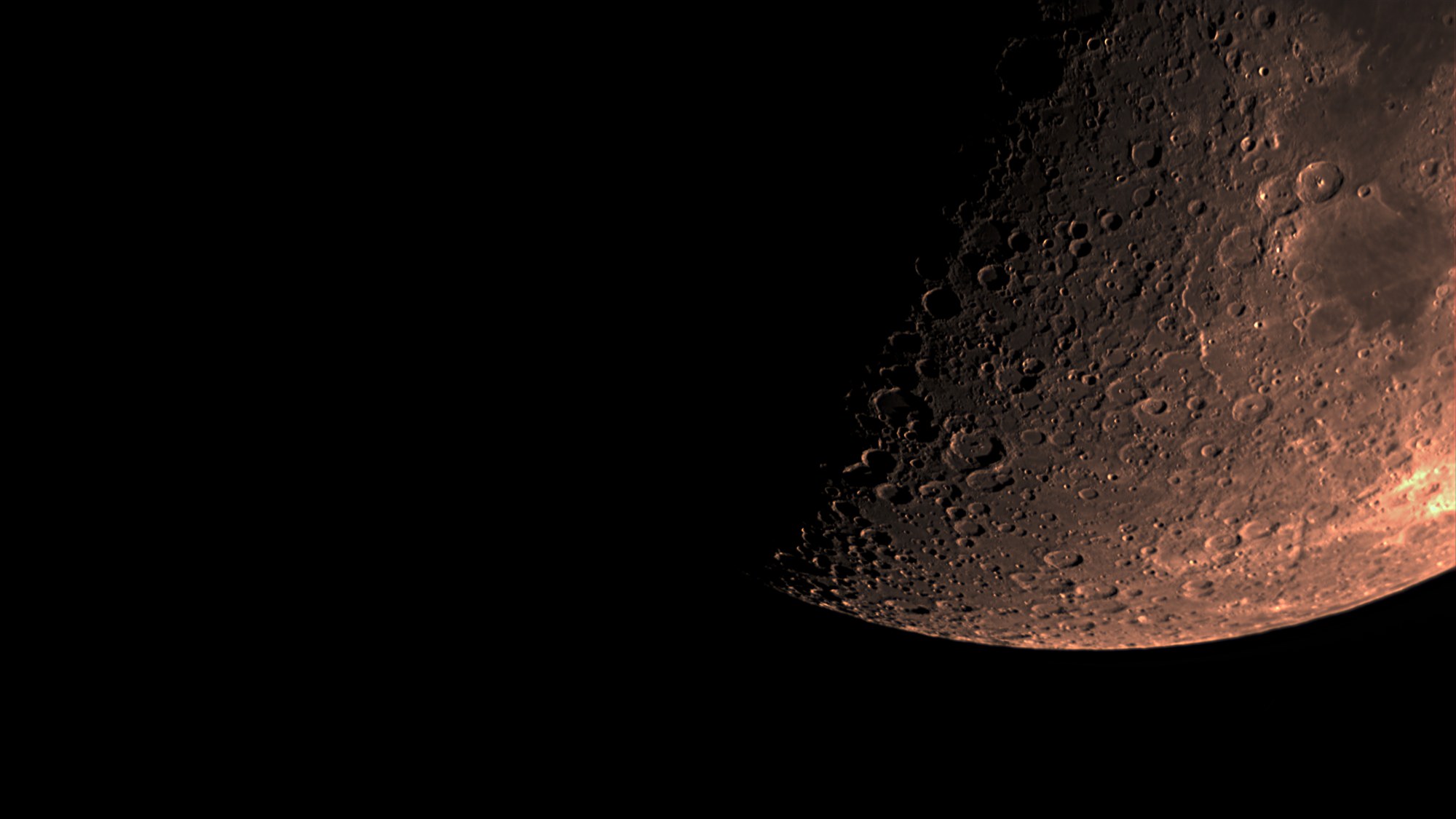 The Moon near first quarter: the southern limb and terminator, cratered highlands in sharp relief, processed in Akastroid